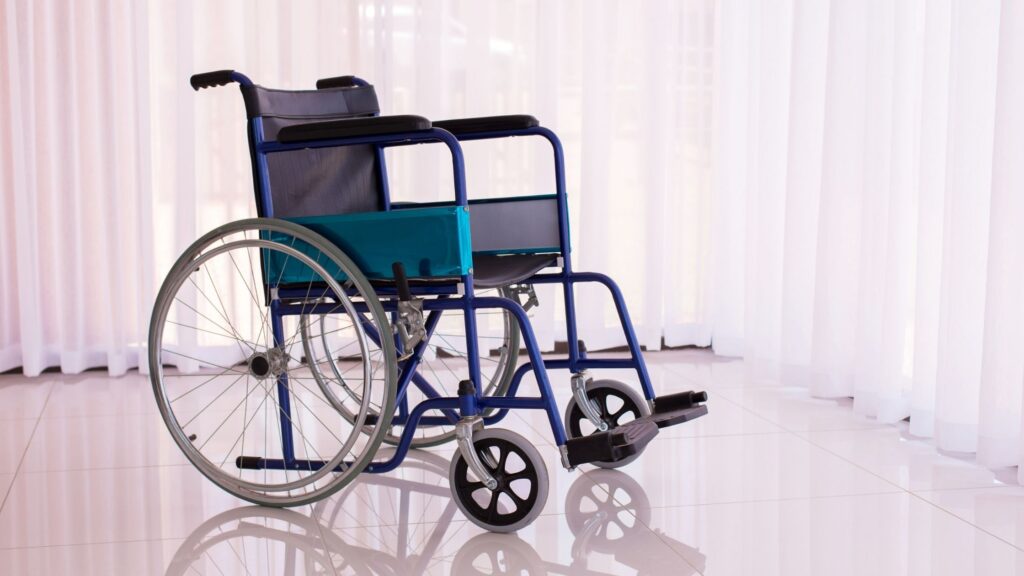 A wheelchair is standing in the inside of home